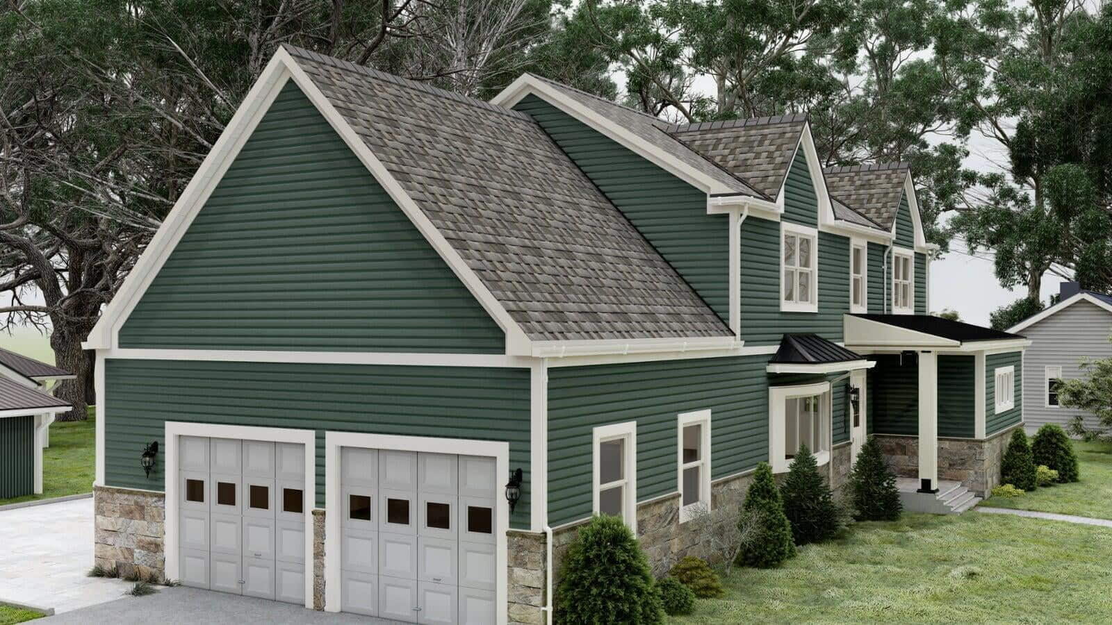 Rear view of a green modular home with white trim and a dark gray roof, highlighting a small patio area and surrounding greenery.