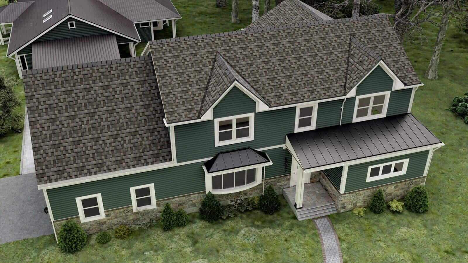 Green modular home with white trim, featuring a front porch, dark gray roof, and a landscaped yard with a sidewalk and shrubs.