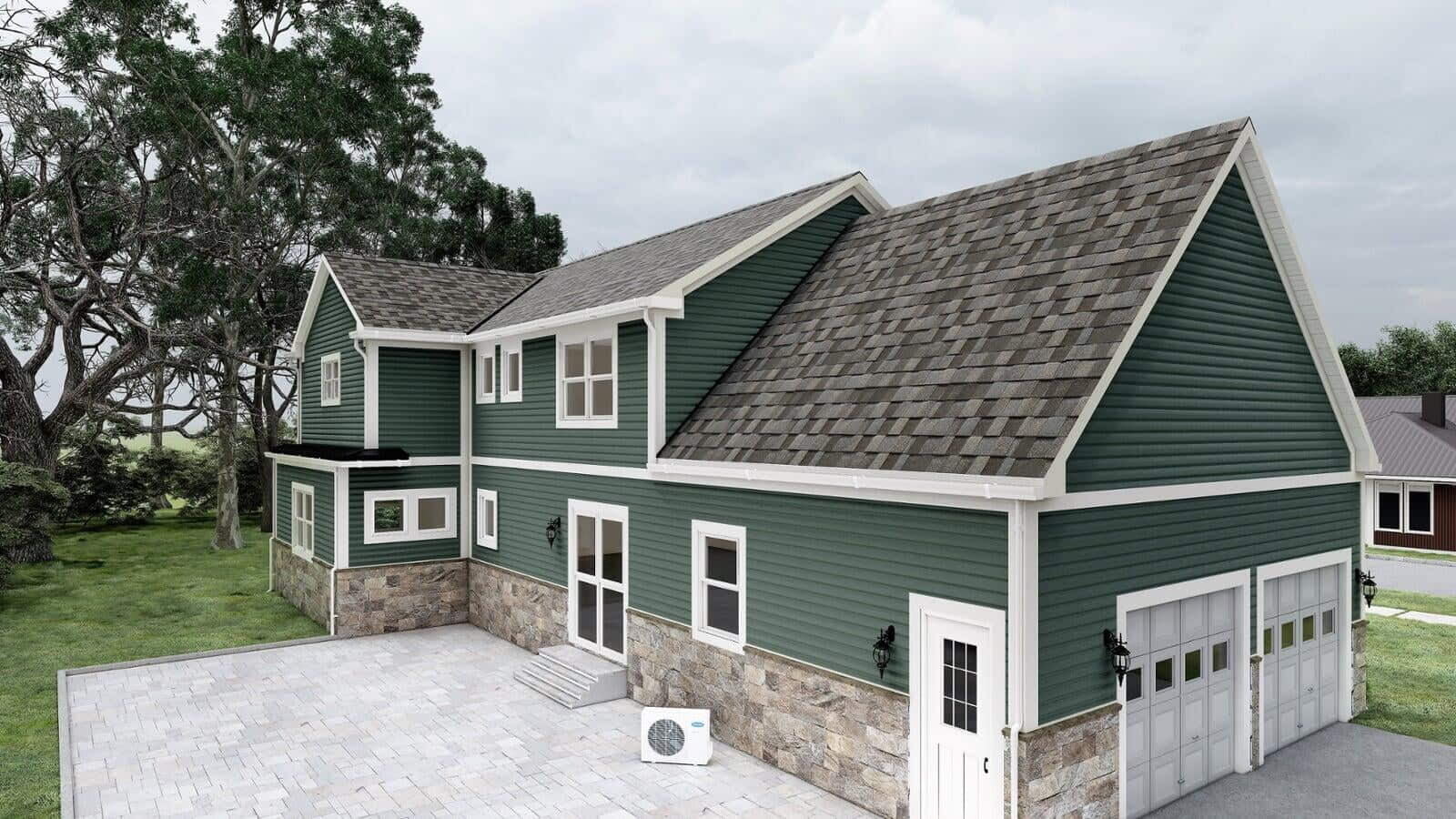 Close-up of the front entrance of a green modular home, showing a white-trimmed window, a small porch, and neatly trimmed shrubs.